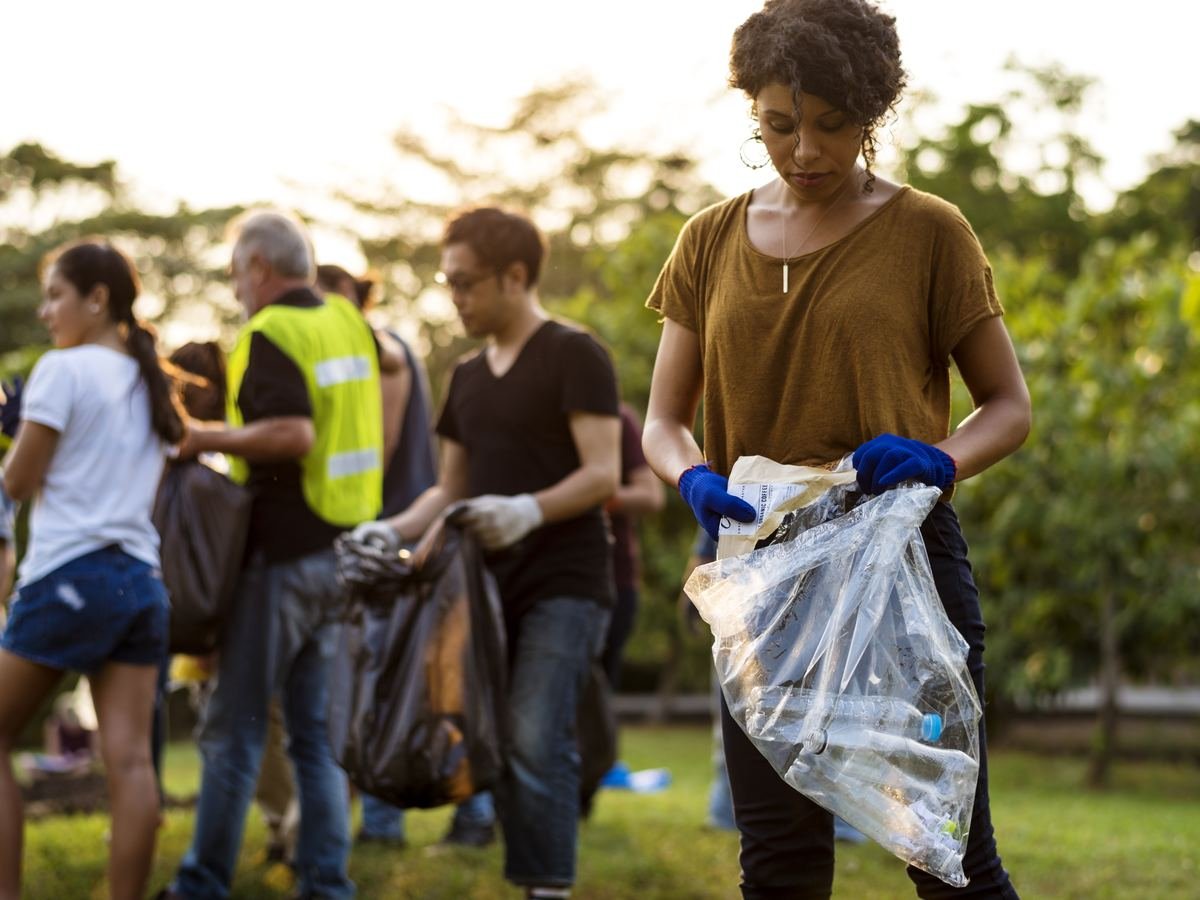 Volunteers picking up litter outdoors together