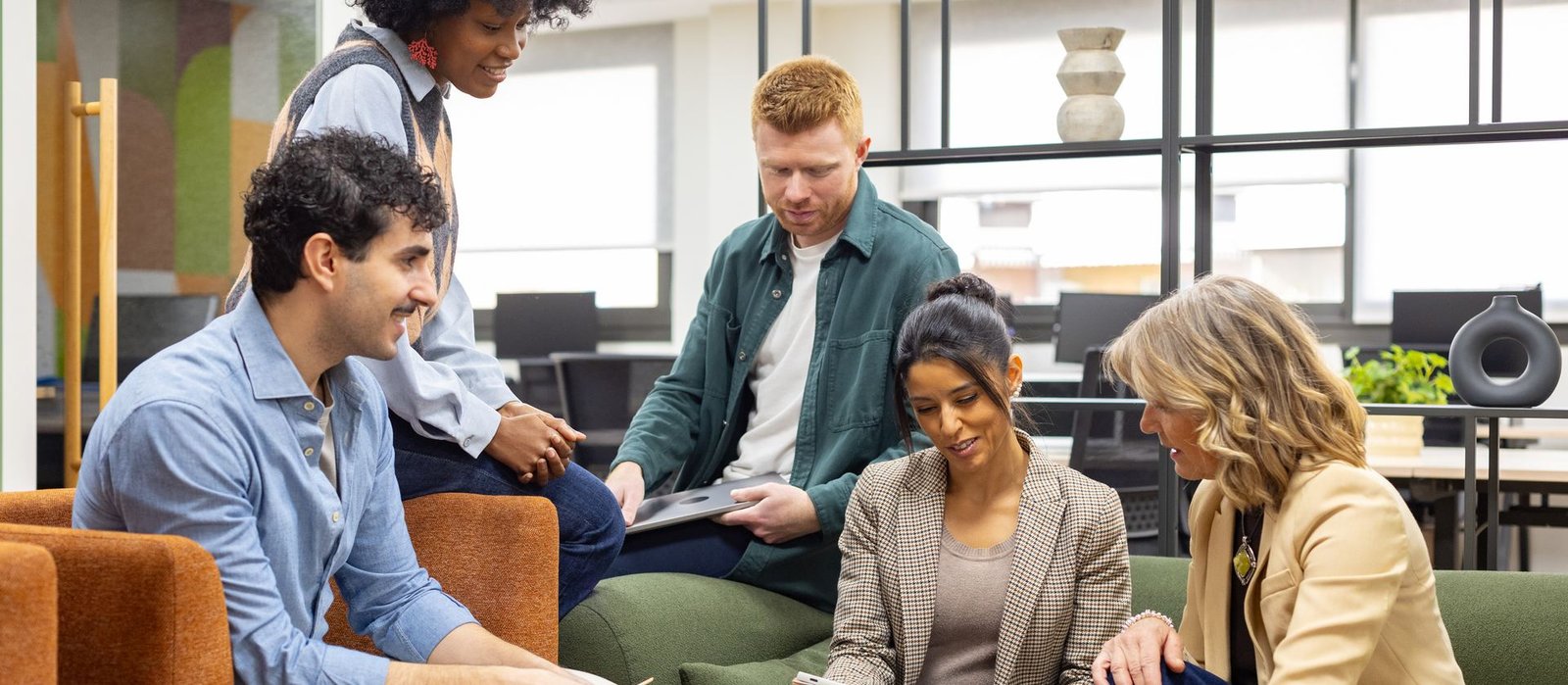 Business professionals discussing strategy together during a meeting